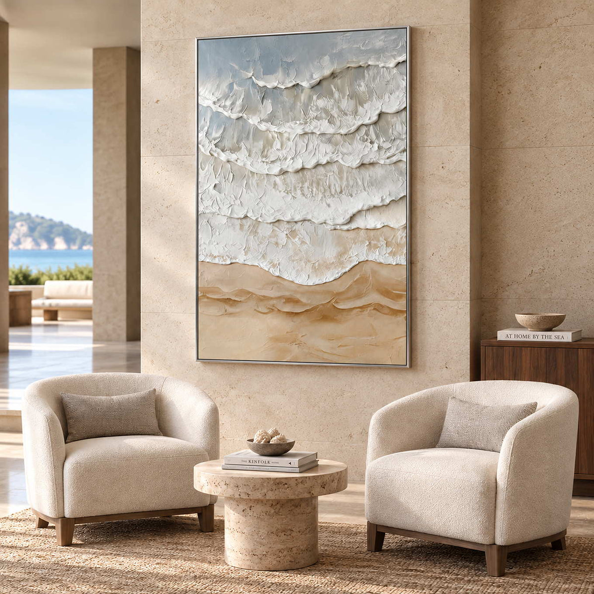 Whispering Tides in a silver frame above two cream armchairs and a small stone table in a commercial lobby.