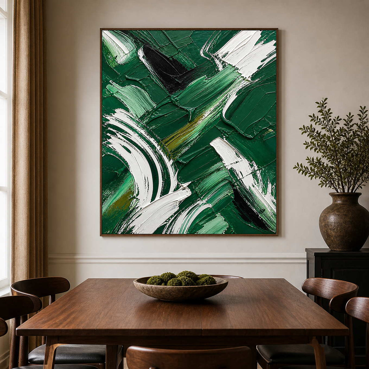 Green and white textured abstract wall art above a dark wood dining table.