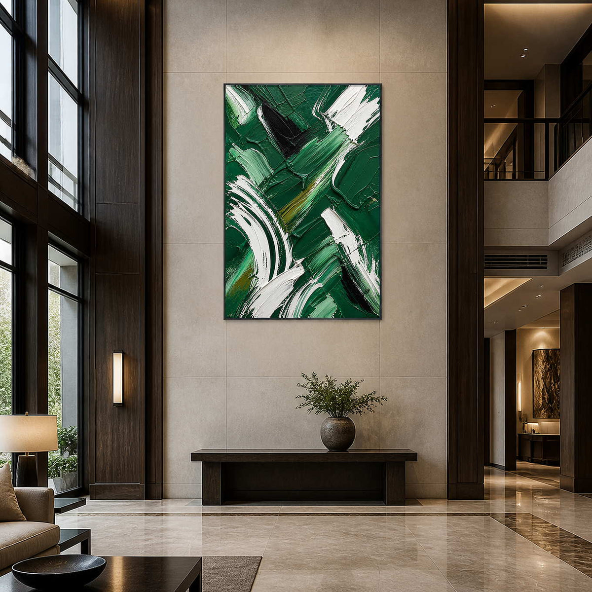 Vertical emerald abstract art displayed in a spacious contemporary hotel lobby.