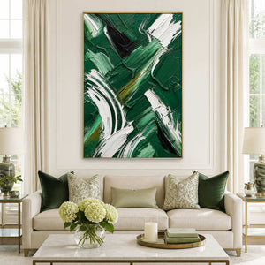 Emerald and white textured abstract wall art in a bright living room.