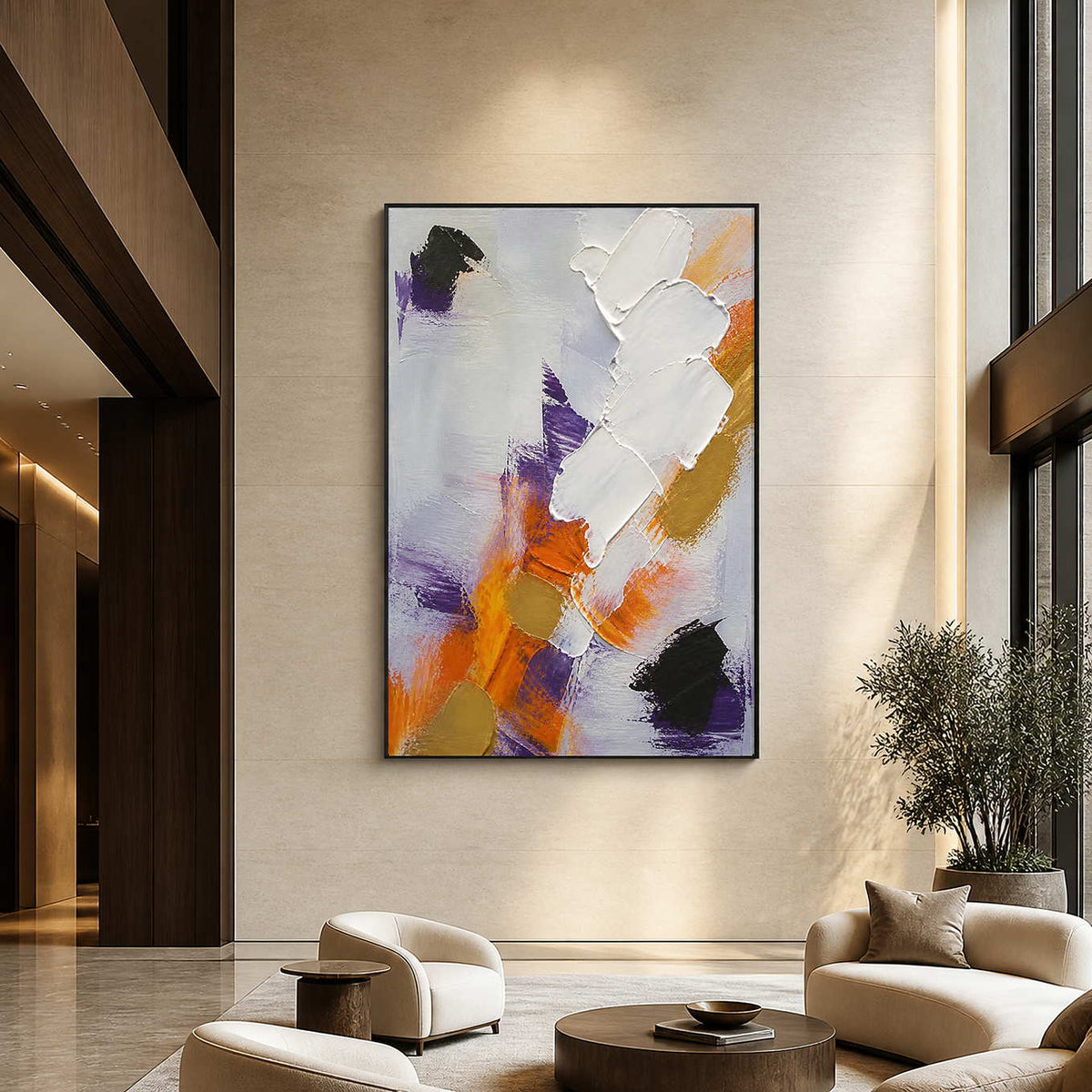 Large vertical abstract wall art displayed in a tall contemporary hotel lobby.