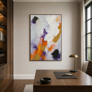 White orange and violet abstract wall art displayed in a warm wood study.