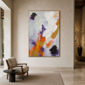 Modern vertical abstract wall art displayed in a quiet private gallery lounge.