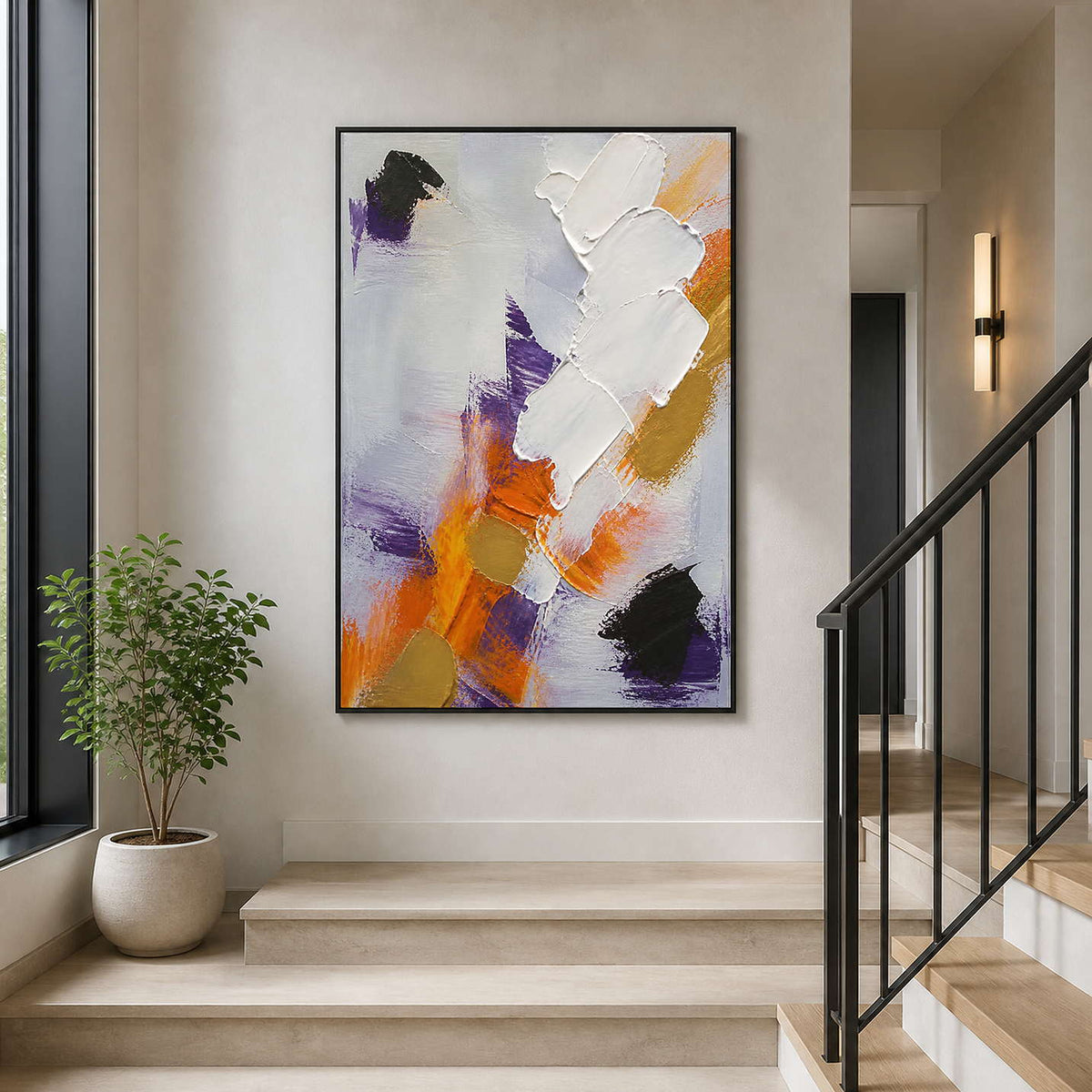 Vertical textured art creating a composed focal point at a bright stair corner.