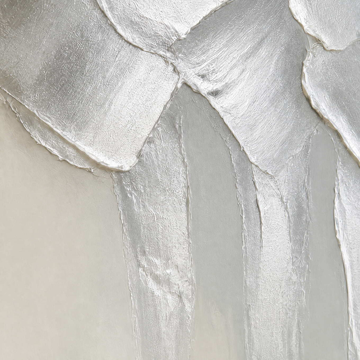 Close-up of raised hand-painted texture in white, neutral, and blue.