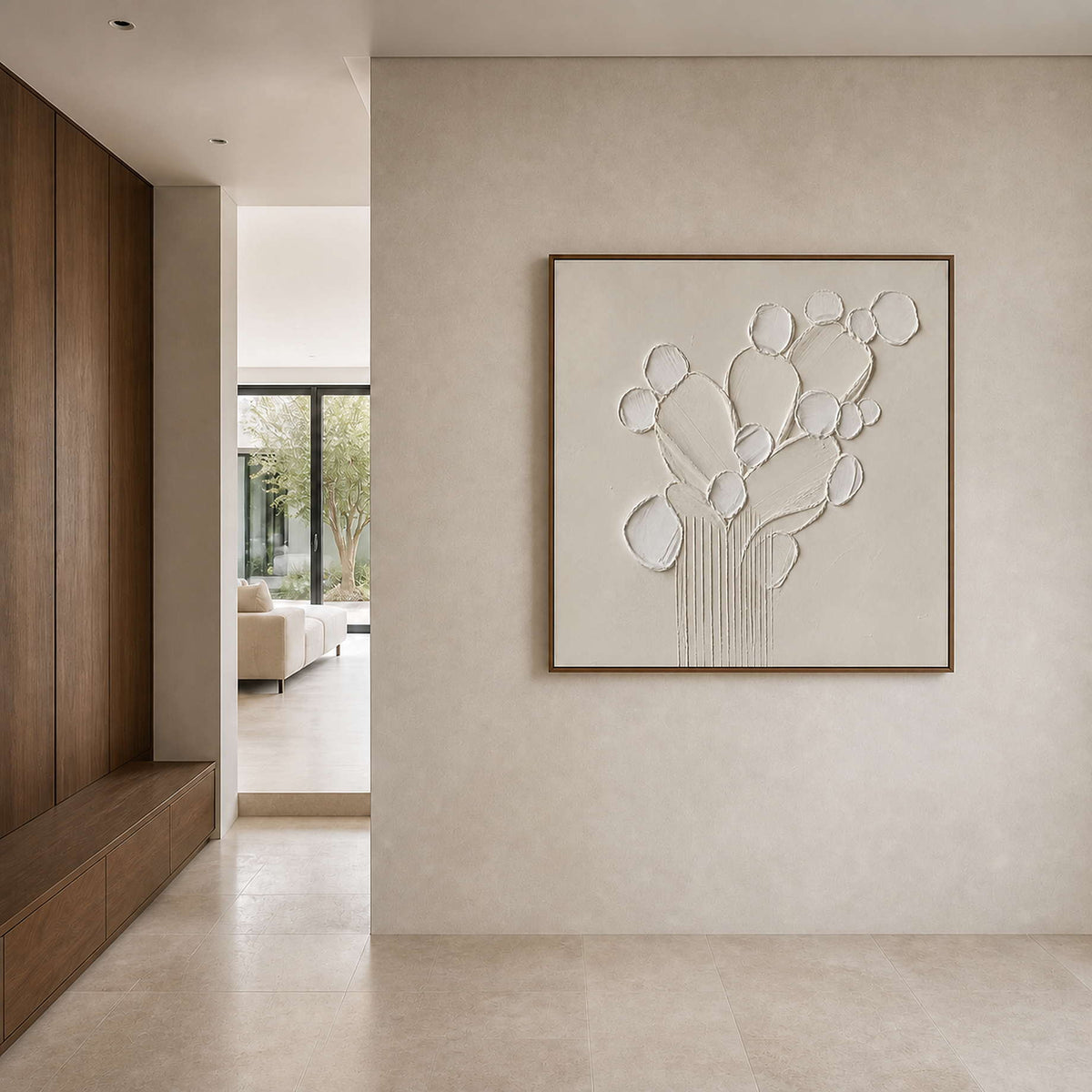 Square white botanical artwork displayed in a stone walnut entry hall.