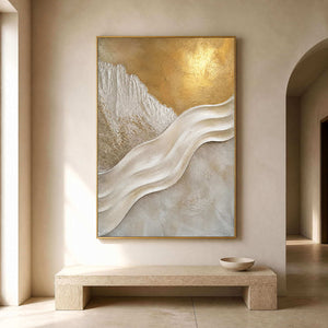 Sculptural white and gold painting in a warm limewash entryway.