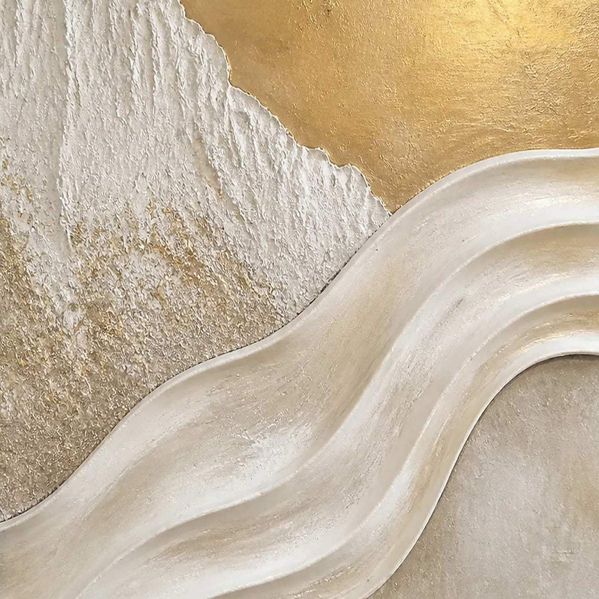Close-up of sculpted ivory waves and luminous hand-painted gold texture.