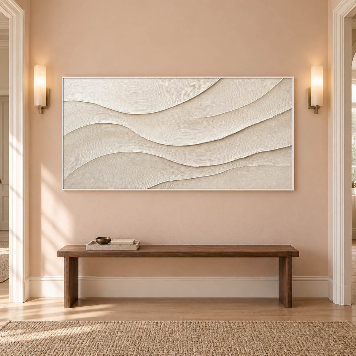 Layered ivory and warm beige relief flowing in quiet panoramic waves, displayed in a hallway in a white frame.