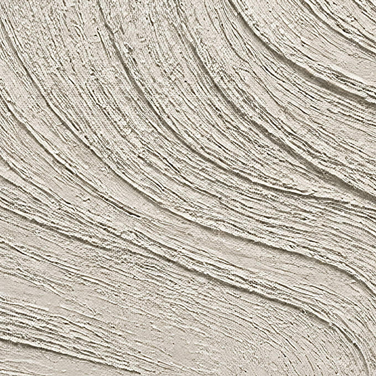 Close-up of flowing hand-worked ridges in chalk white and pale stone.