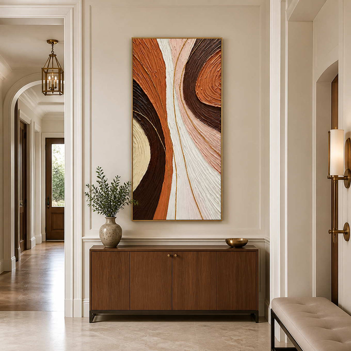 Gold-framed flowing abstract wall art above a wooden console in a paneled hallway.