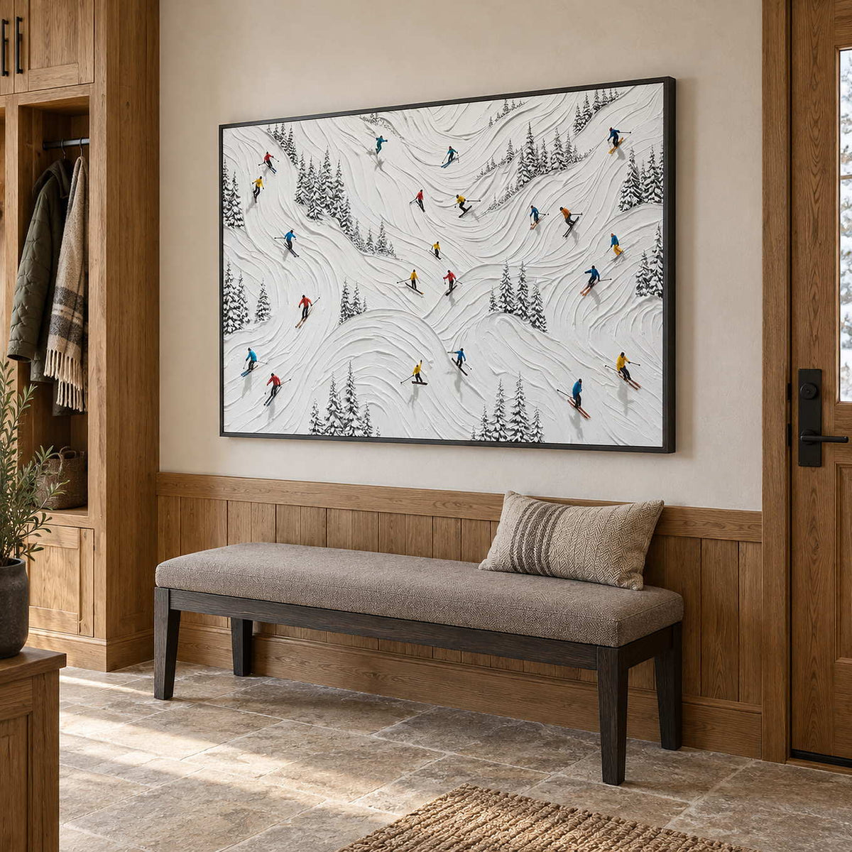 Winter at Play in a black frame above a padded entryway bench surrounded by warm wood paneling.