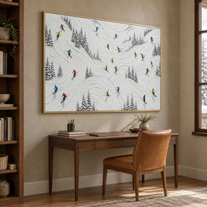 Winter at Play in a gold frame above a wood desk and brown leather chair in a home study.
