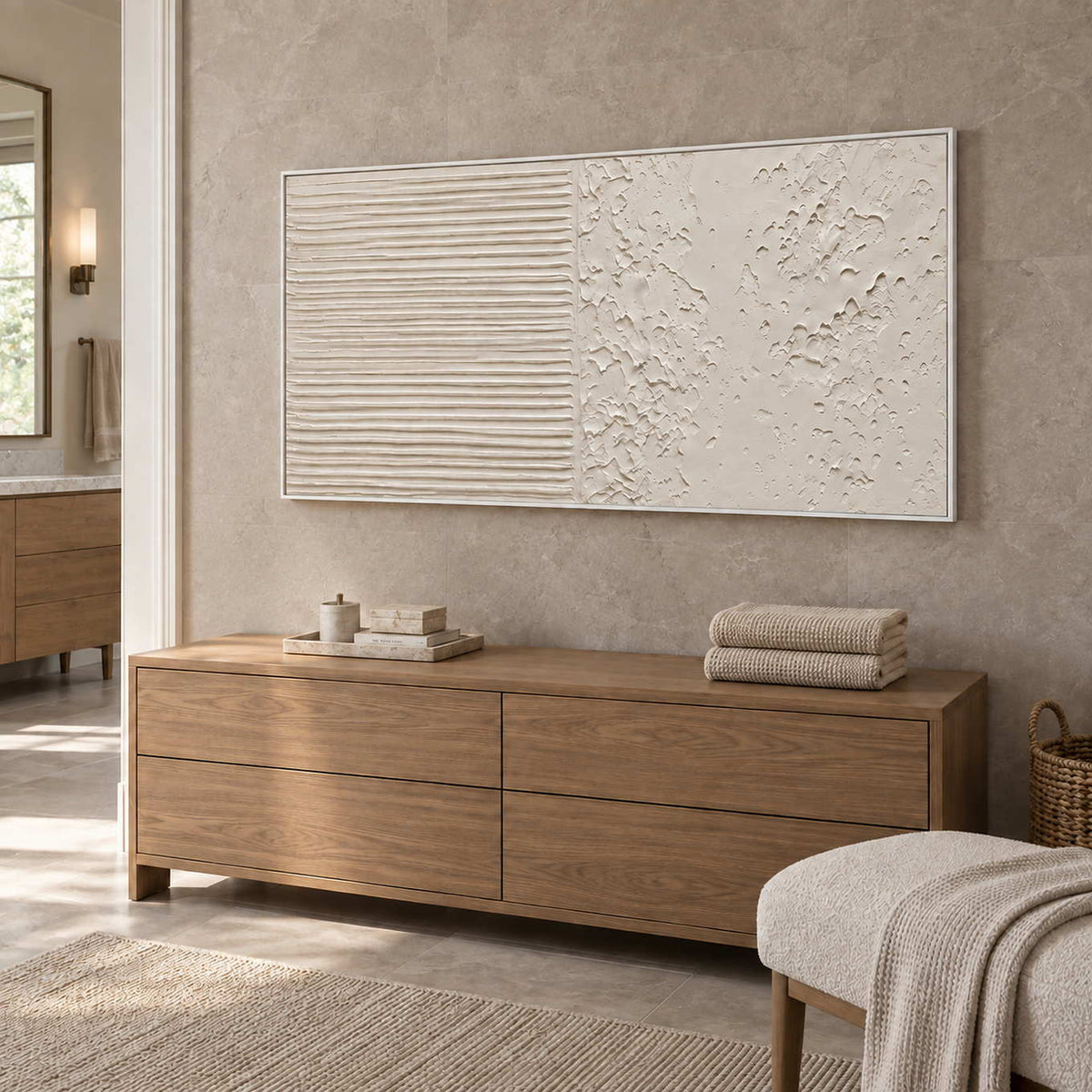 Wordless Dialogue in a white frame above a wood cabinet with folded towels beside a bathroom vanity.