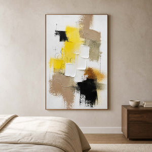 Vertical textured yellow wall art adding a bright accent to a calm bedroom.