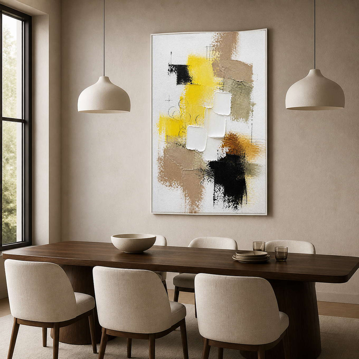 Modern yellow and neutral wall art displayed beside a dark wood dining table.